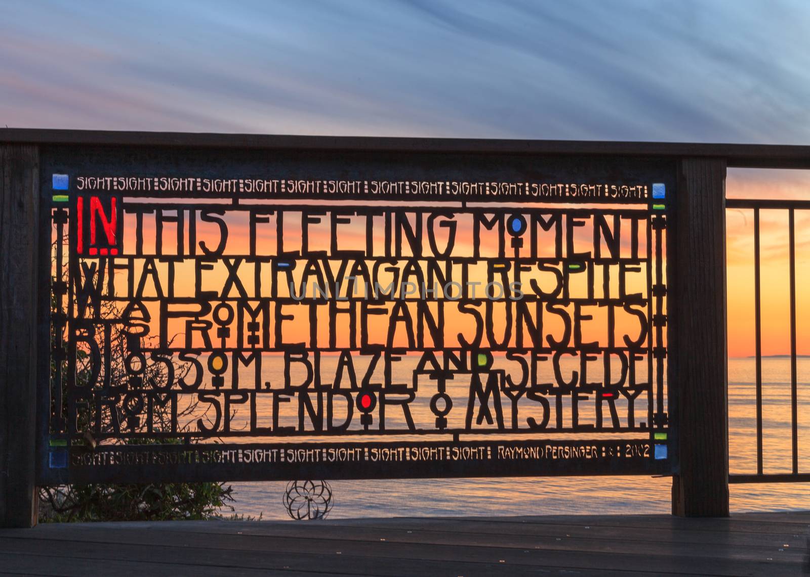 Stained glass fence at Browns Park in Laguna Beach, California at sunset.