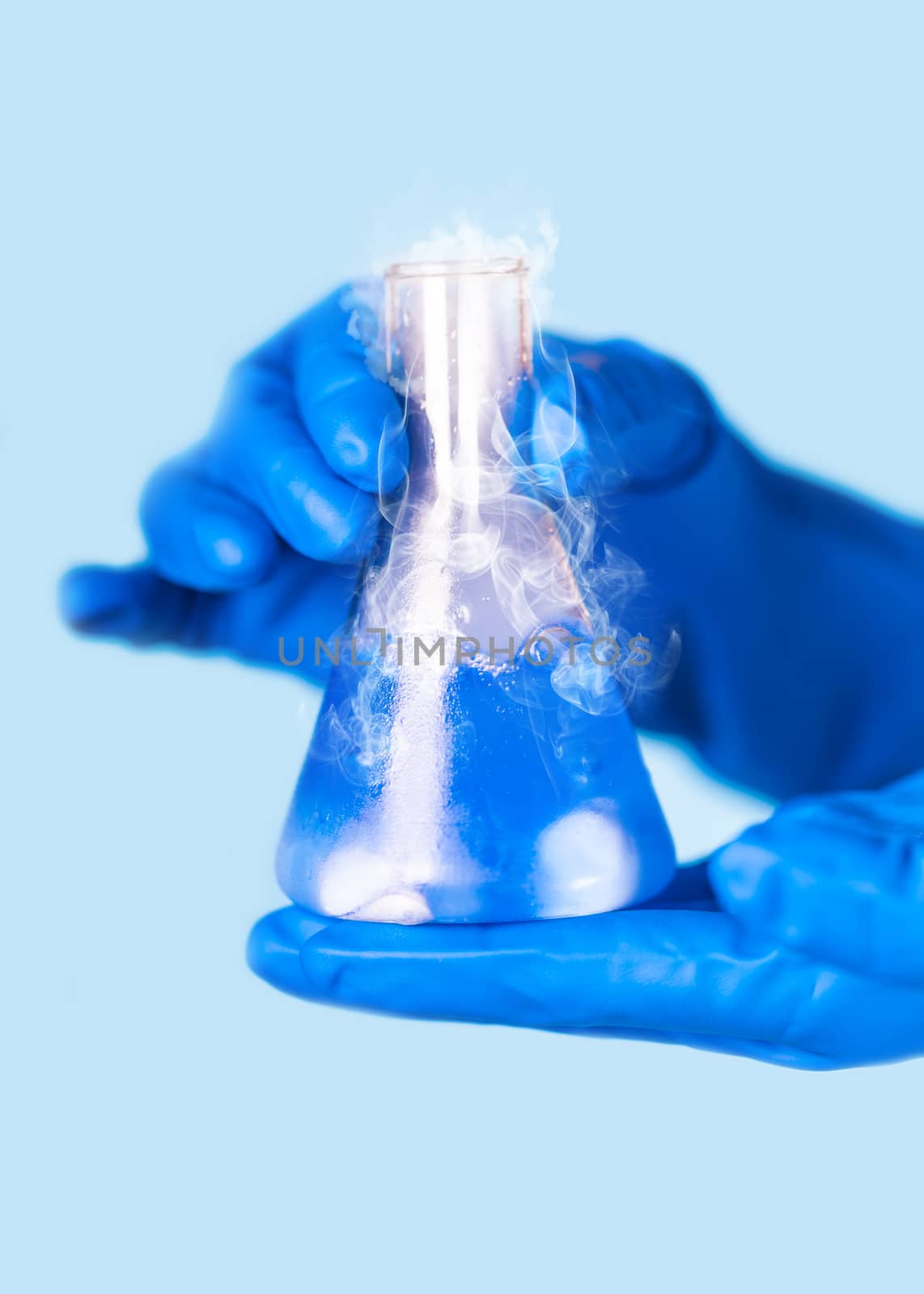 chemical reagent a test tube in the hands