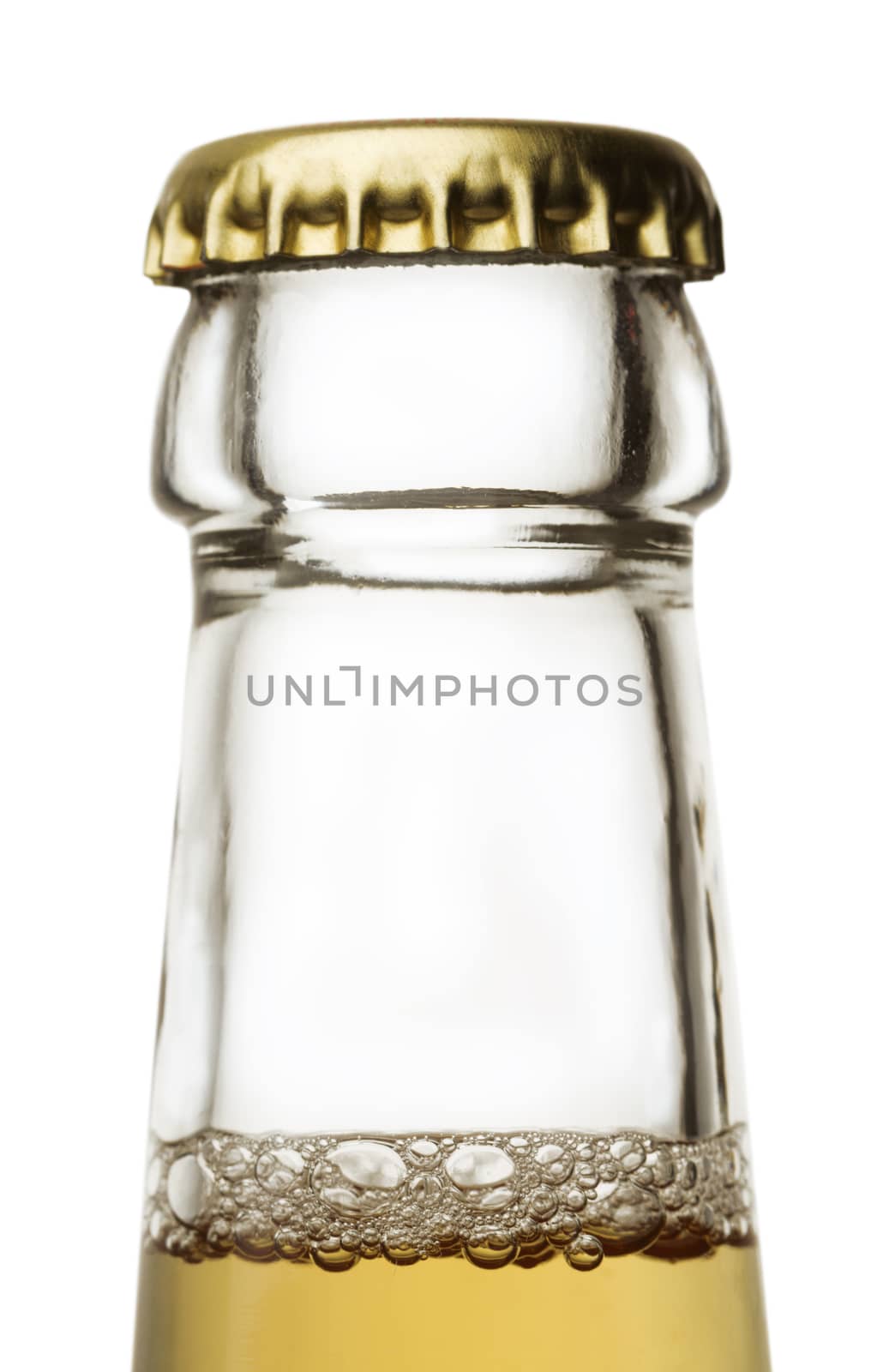 Beer bottle close up isolated on white with a bit of froth and golden cap