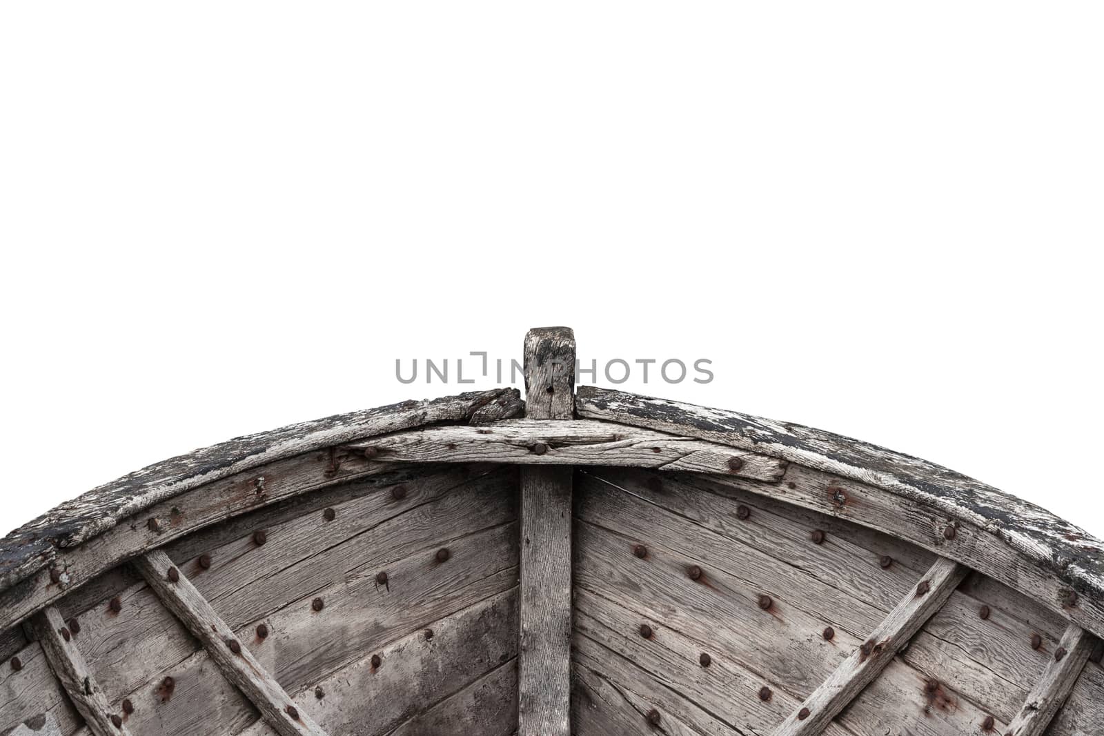 Horizontal photo of an old fishing wood boat with rusted nails isolated on white background