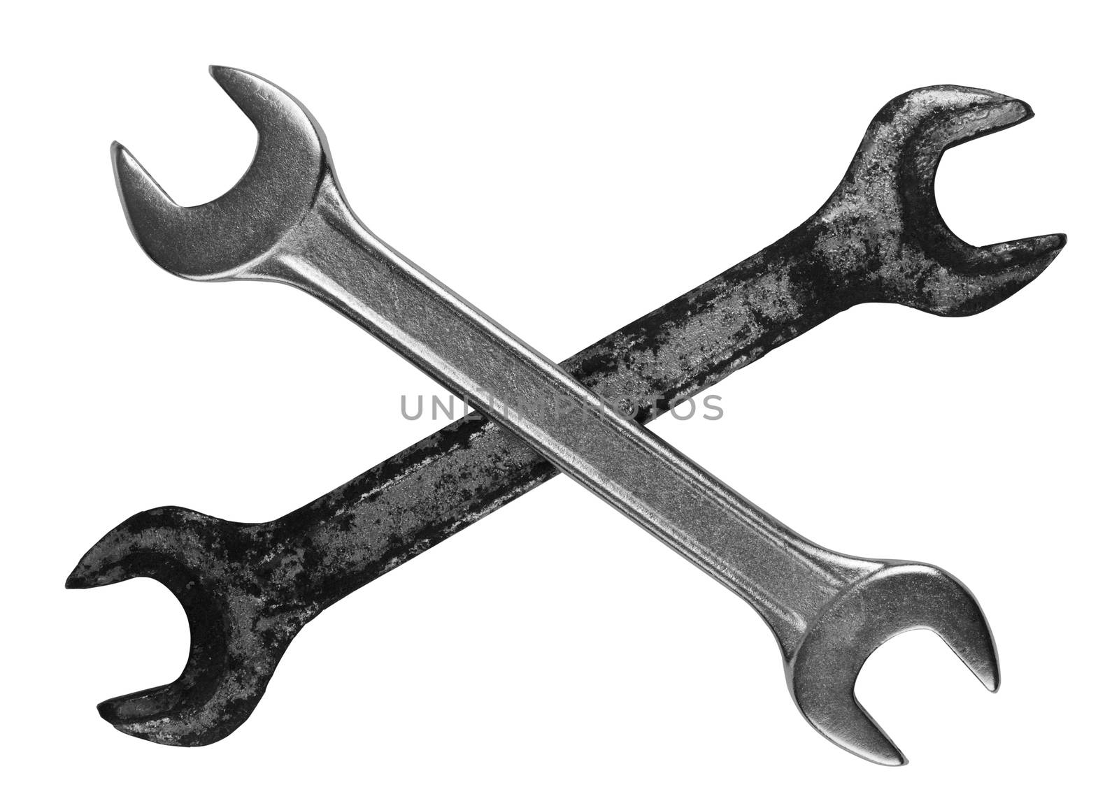 Two wrenches one rusted, one new on top of each other