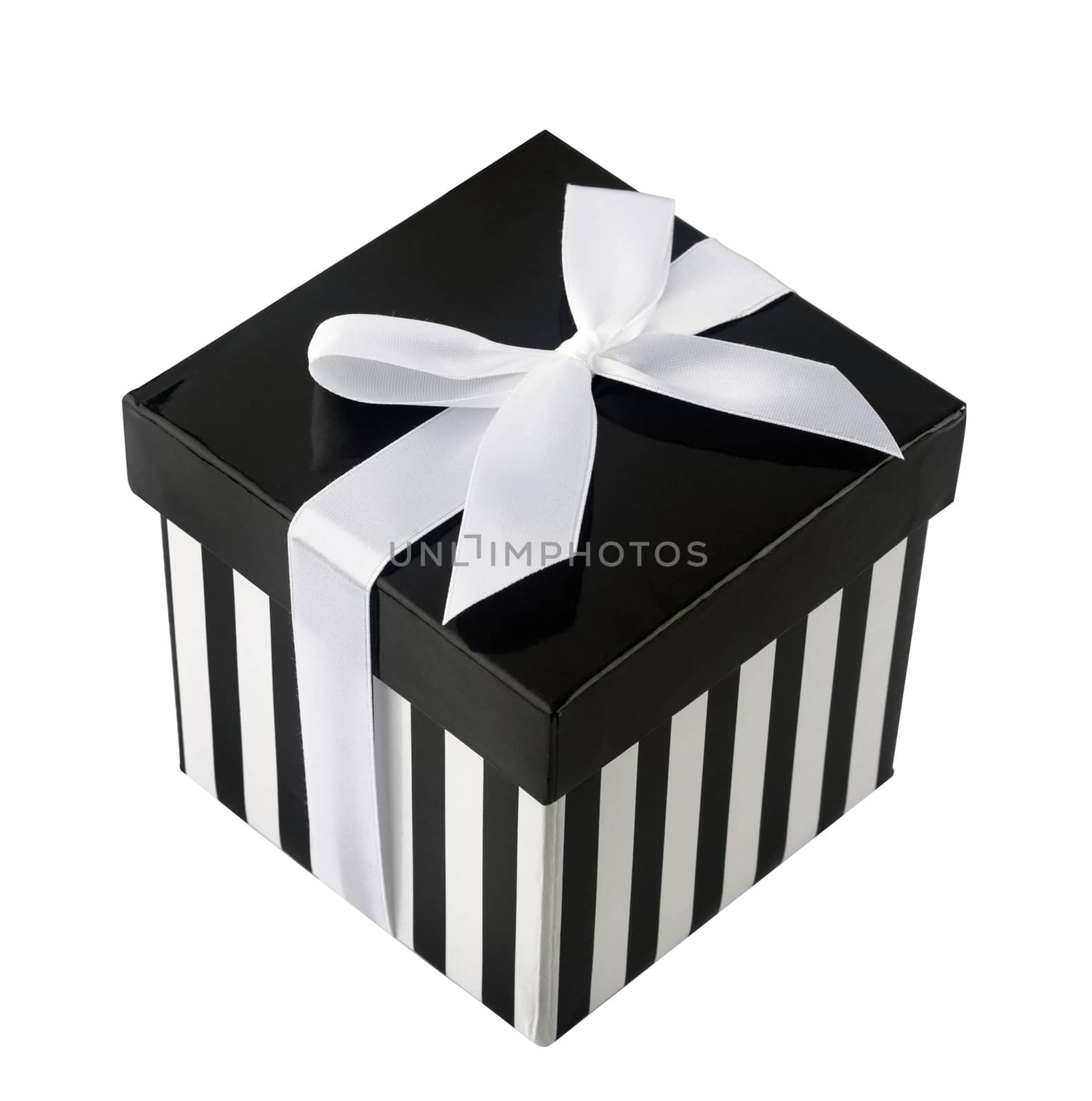 Closed box with black and white stripes and white ribbon isolated on white background

