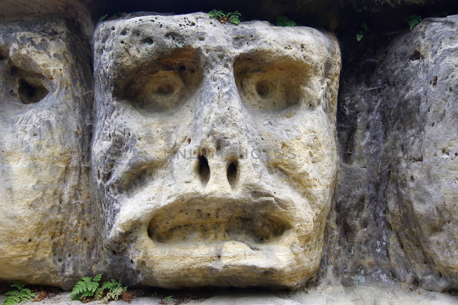 Haunted Stone Heads by Mibuch