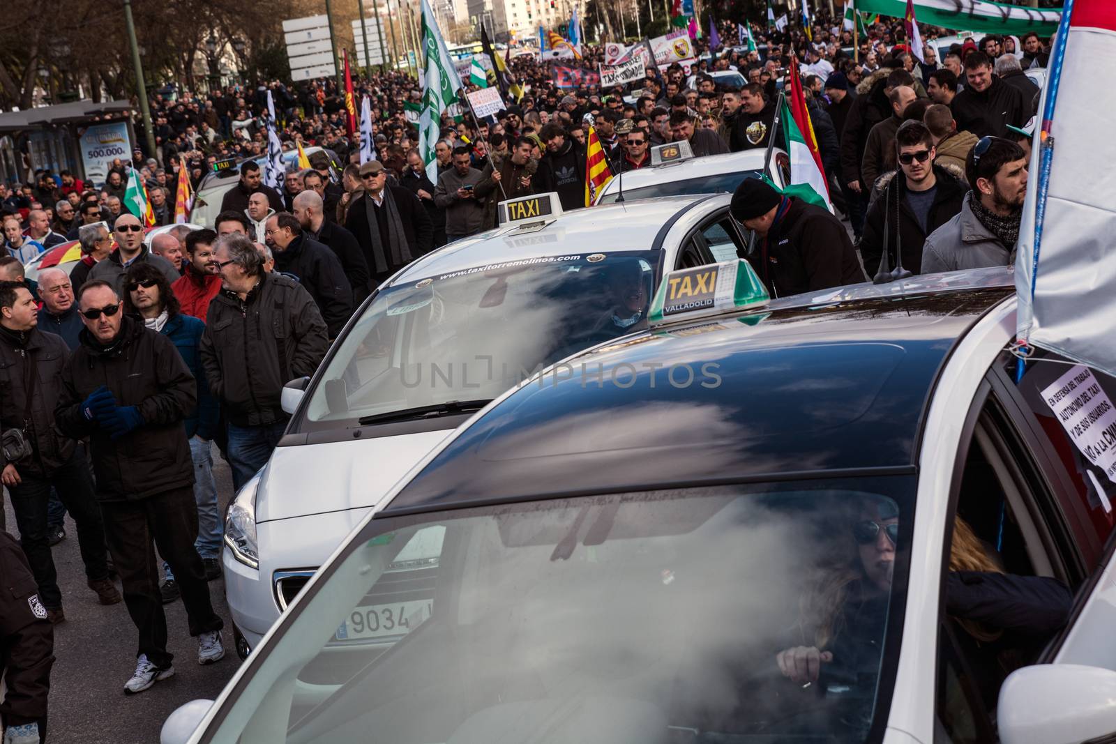 SPAIN, Madrid: Thousands of taxi drivers demonstrate against deregulation and ride-hailing companies such as Uber, in Madrid, on February 18, 2016.