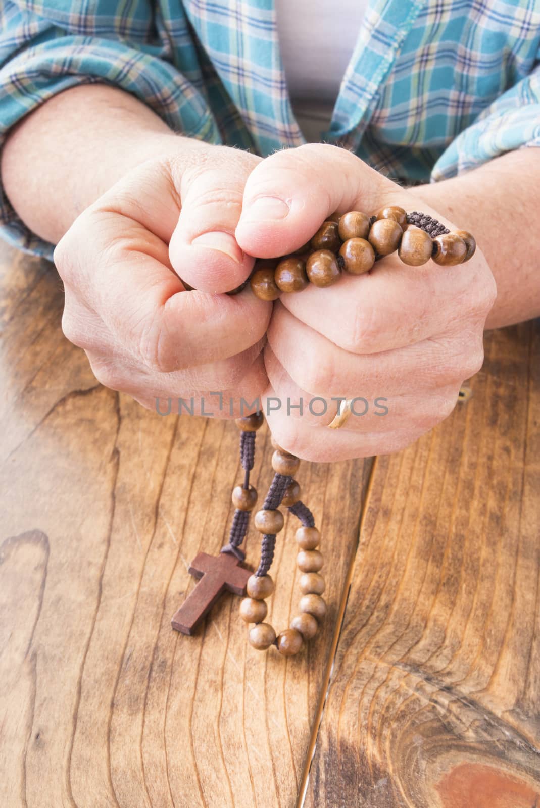 Woman with Rosary Beads in Her Hands