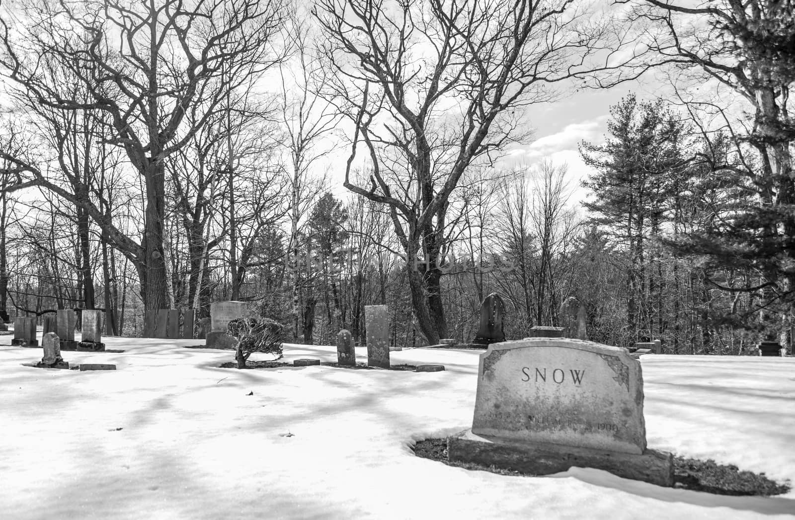 early american gravestones and cemetery  covered in snow