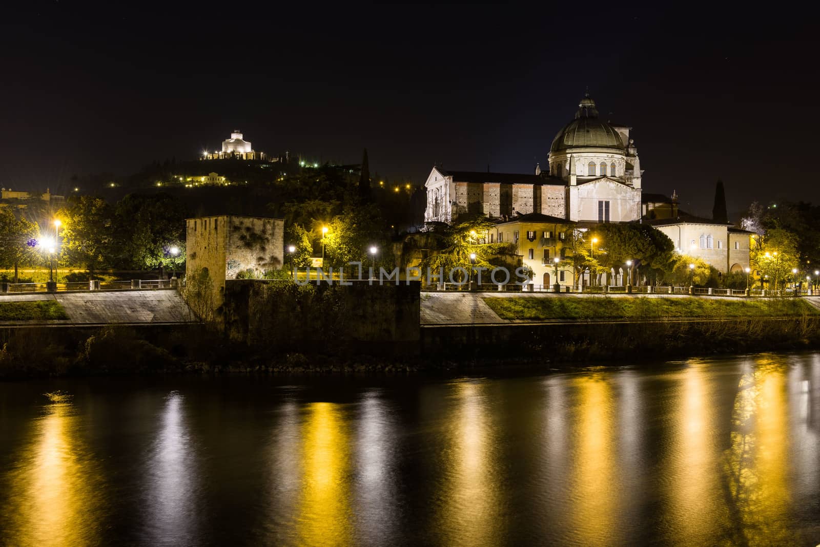 San Giorgio Martire and river Adige in Verona, seen at night