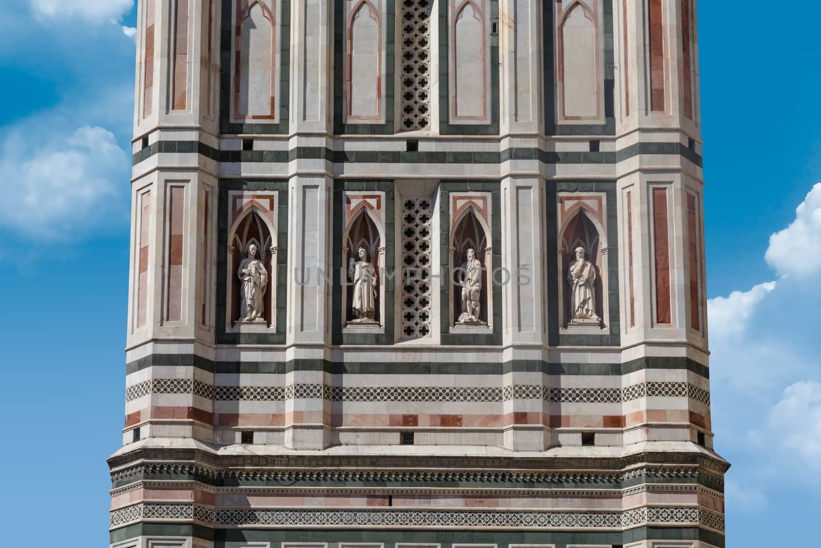 Close up detailed view of belfry of Santa Maria Del Fiore, famous Florence Duomo, with detailed sculptures of renaissance time.