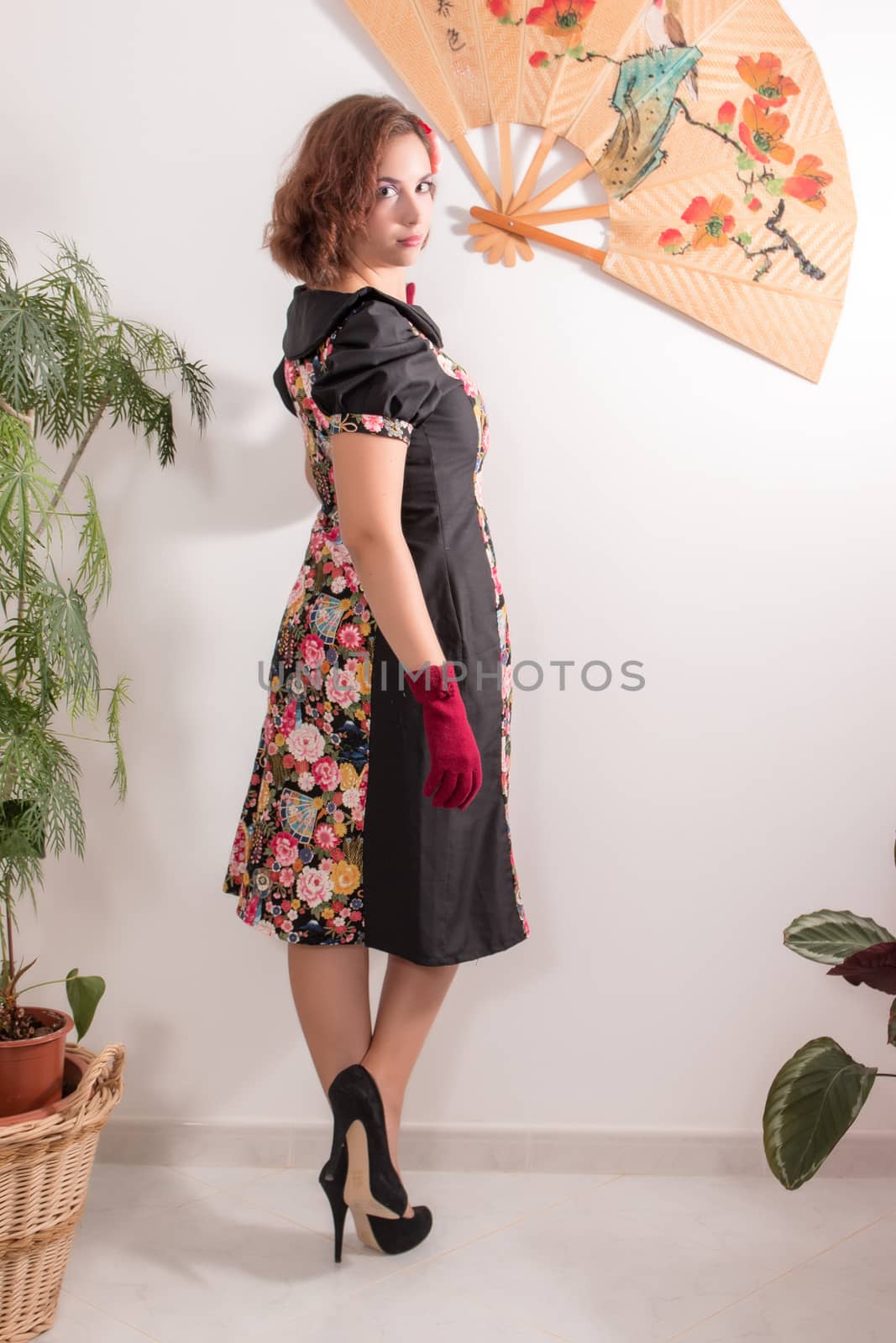 young girl with a japanese style dress in her home by membio