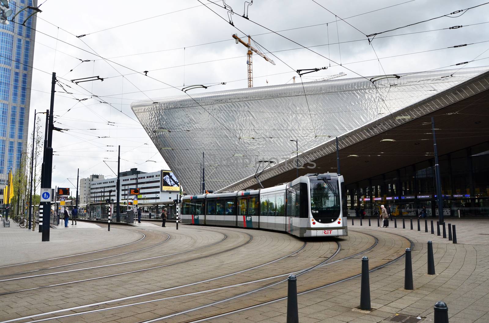 Rotterdam, Netherlands - May 9, 2015: Passengers at Rotterdam Central Station. by siraanamwong