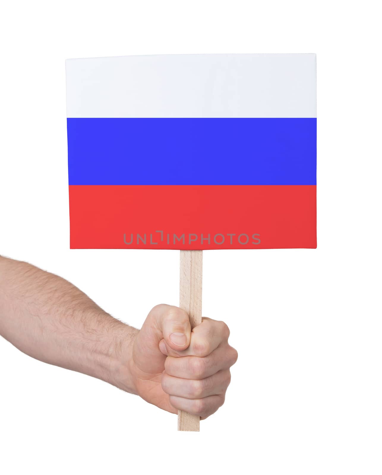 Hand holding small card, isolated on white - Flag of Russia