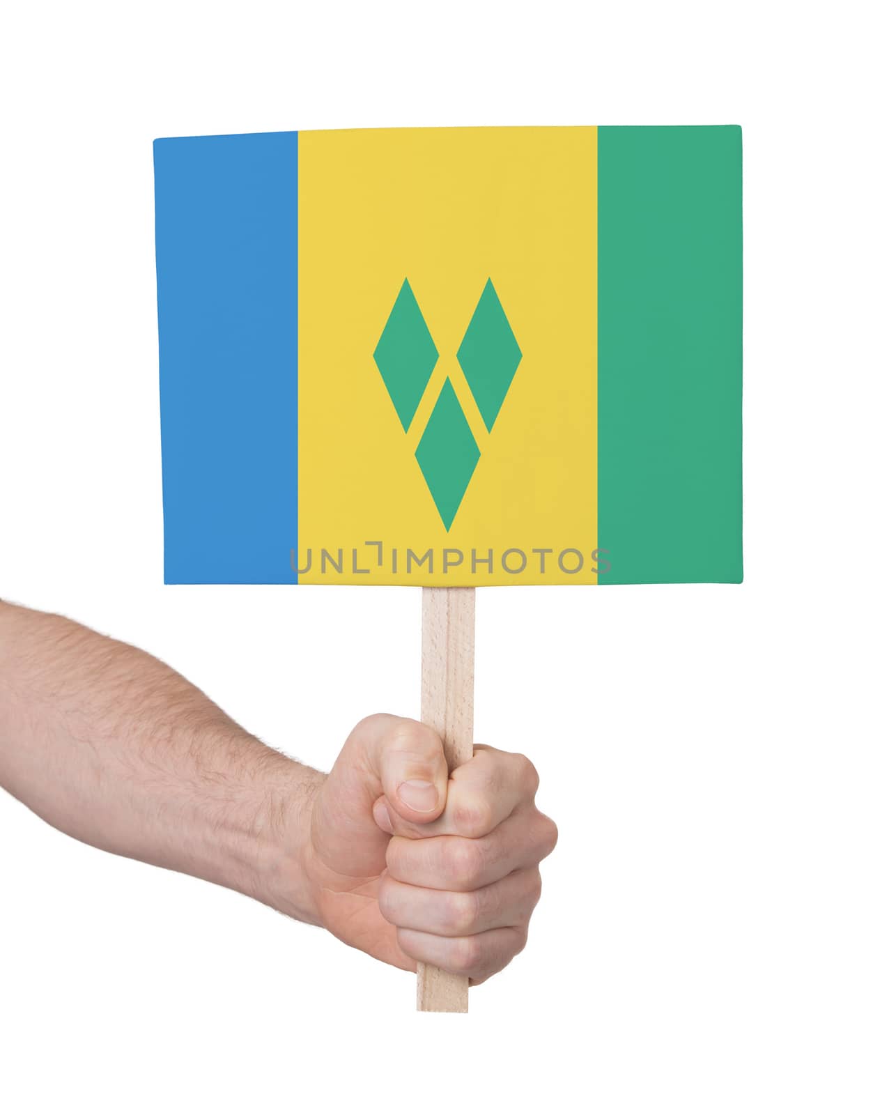 Hand holding small card, isolated on white - Flag of Saint Vincent and the Grenadines