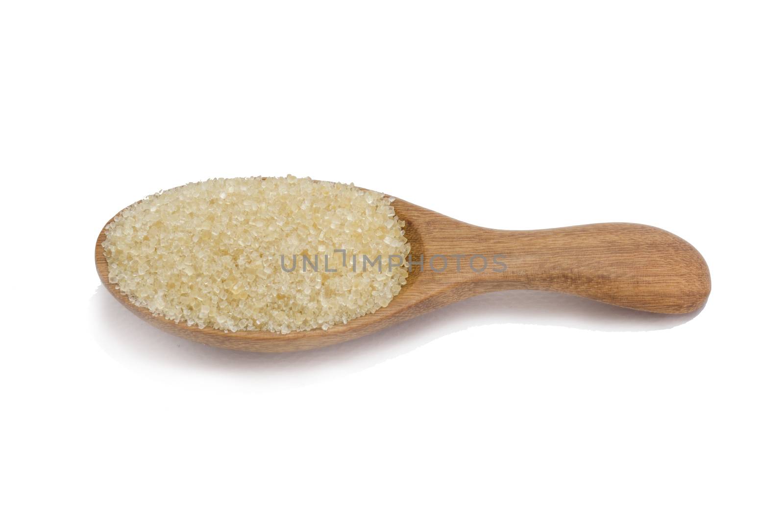 brown sugar in wooden spoon isolated on white