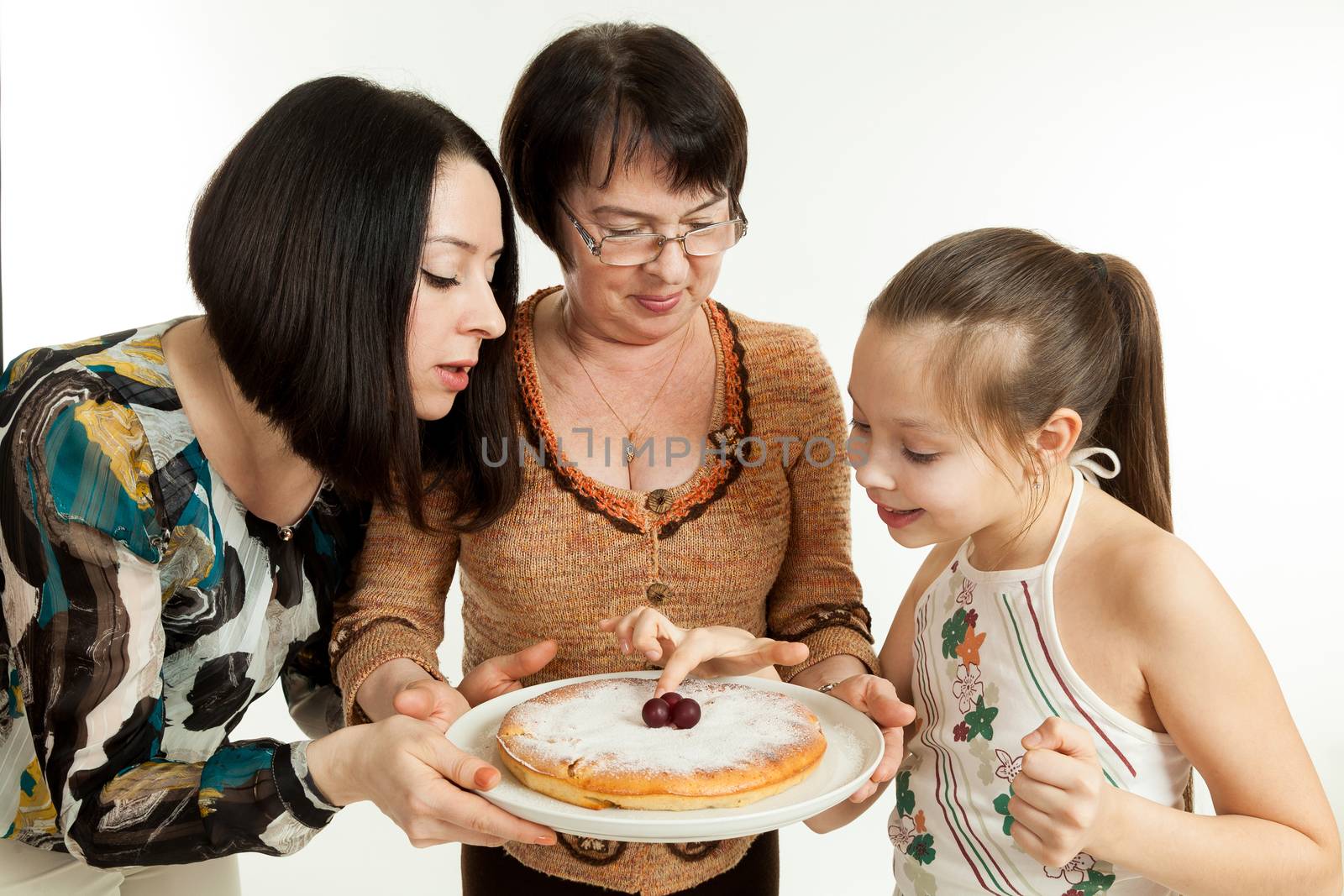 the grandmother holds the pie  by sveter