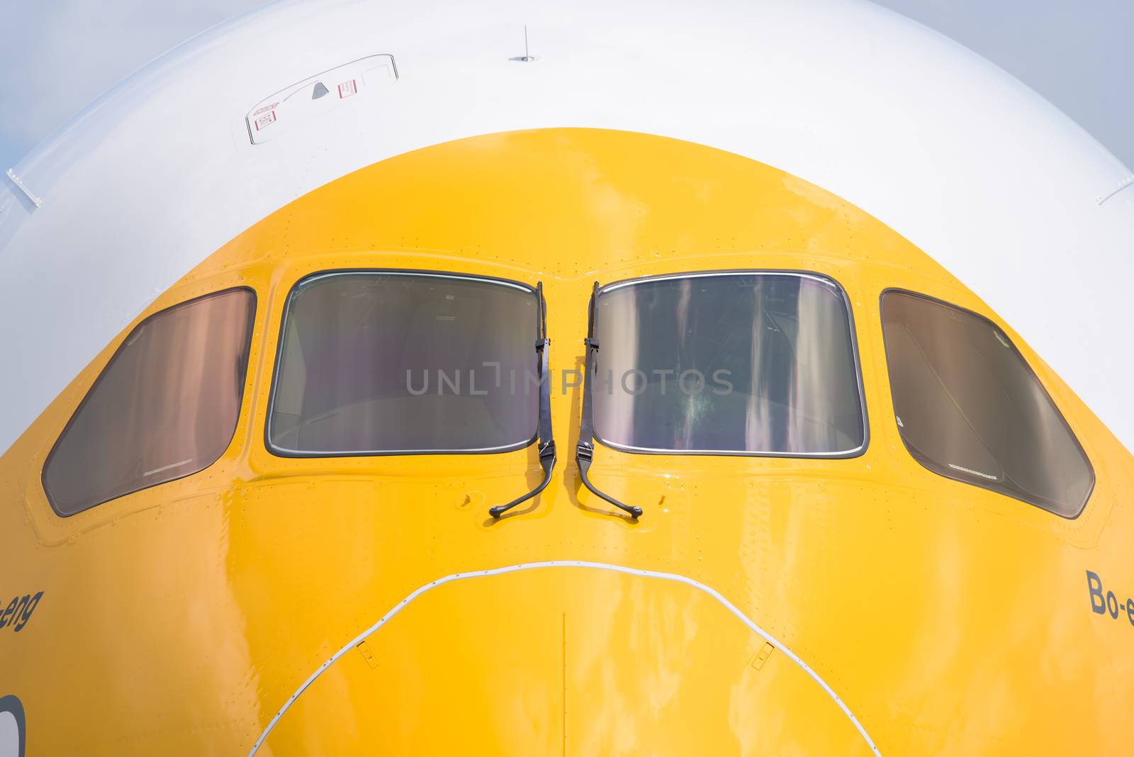 Singapore - February 16, 2016: Front detail of a Boeing 787-9 Dreamliner in the livery of no frills Singapore airline Scoot during Singapore Airshow at Changi Exhibition Centre in Singapore.