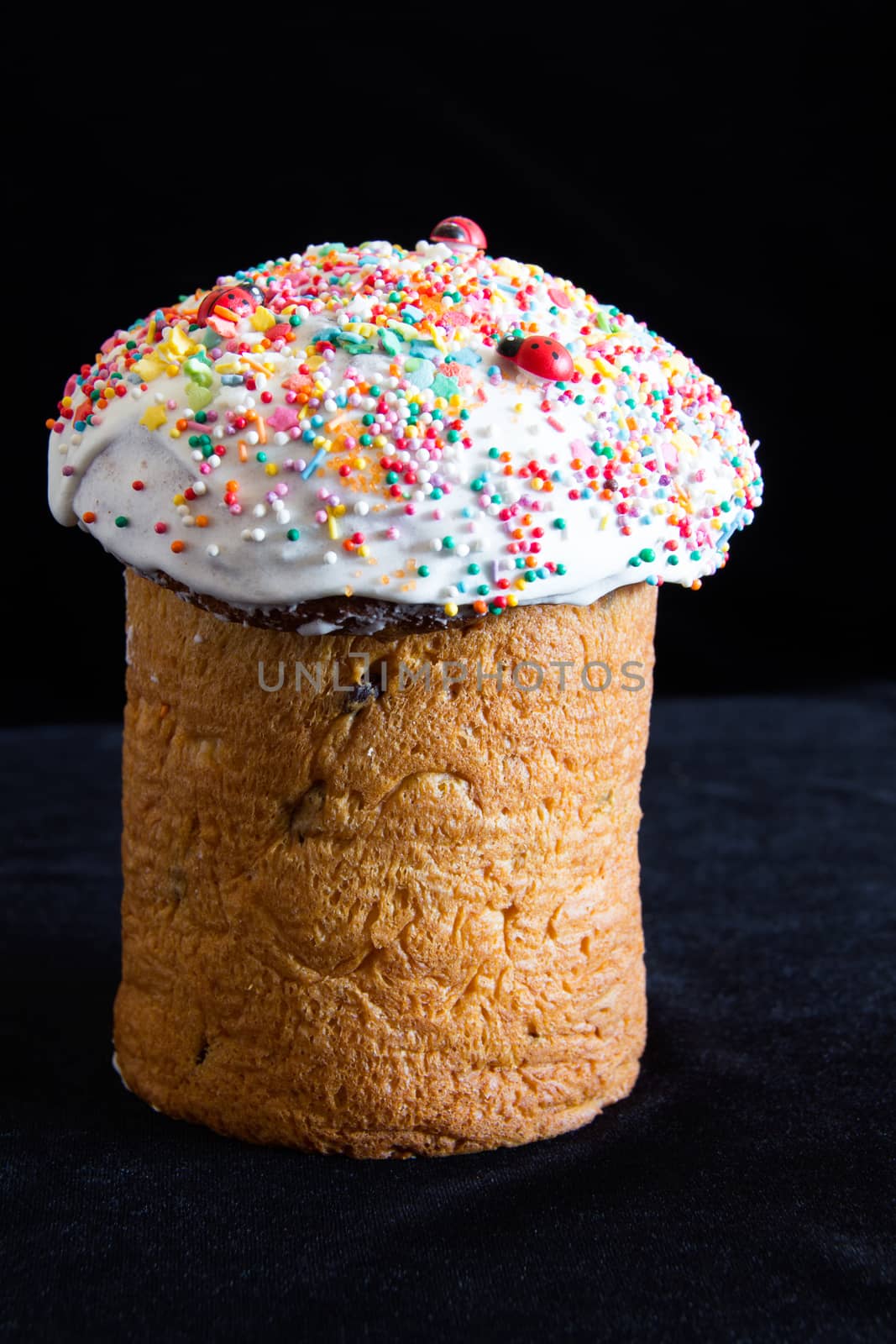 Photo of decoration Easter cake on black background