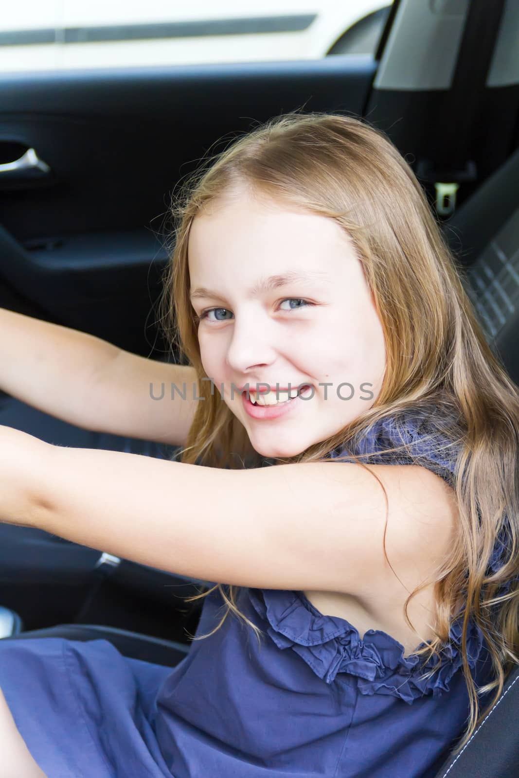 Portrait of cute girl with blond hair