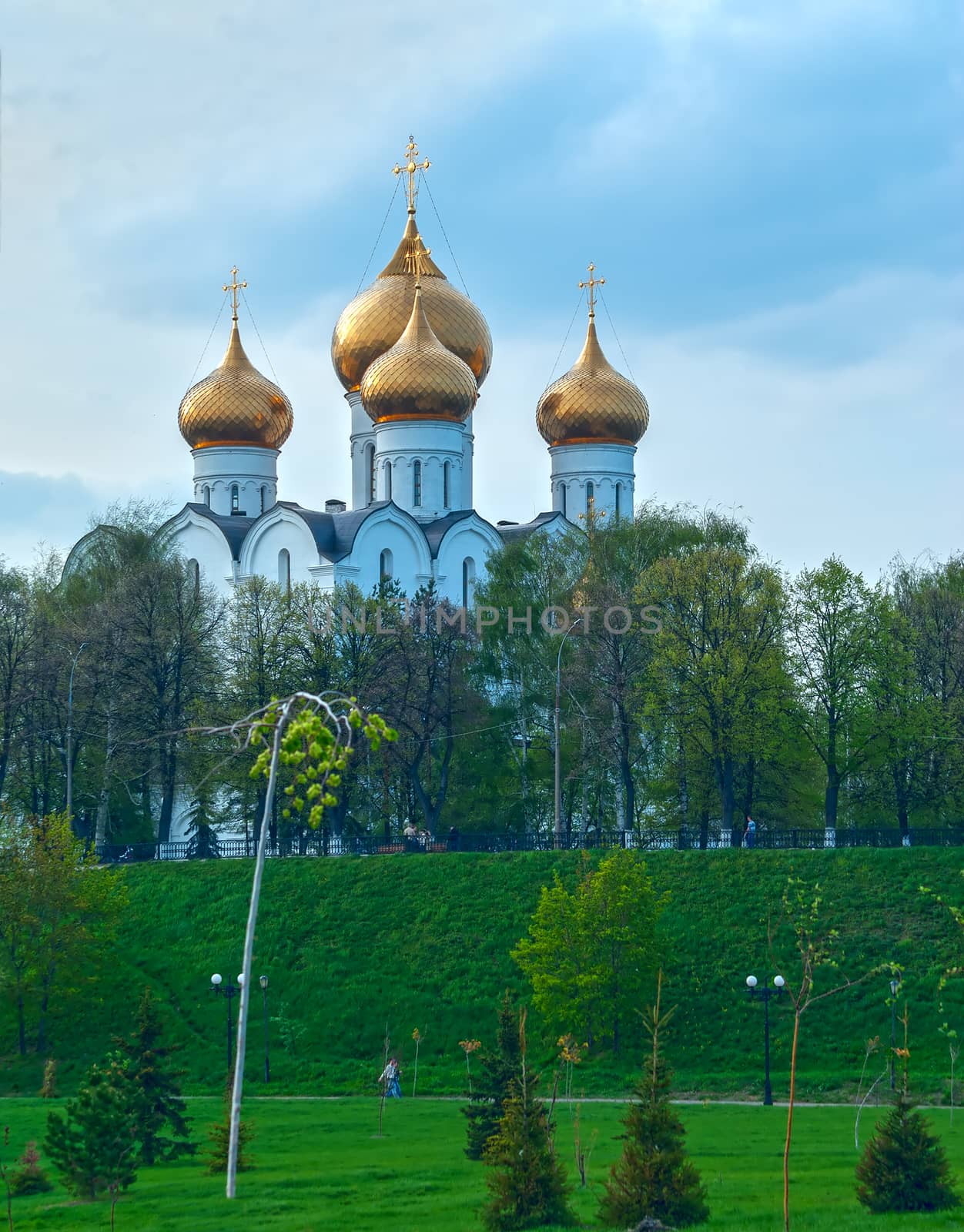 Ancient ortodox christian curch with golden domes in cloudy day by BIG_TAU