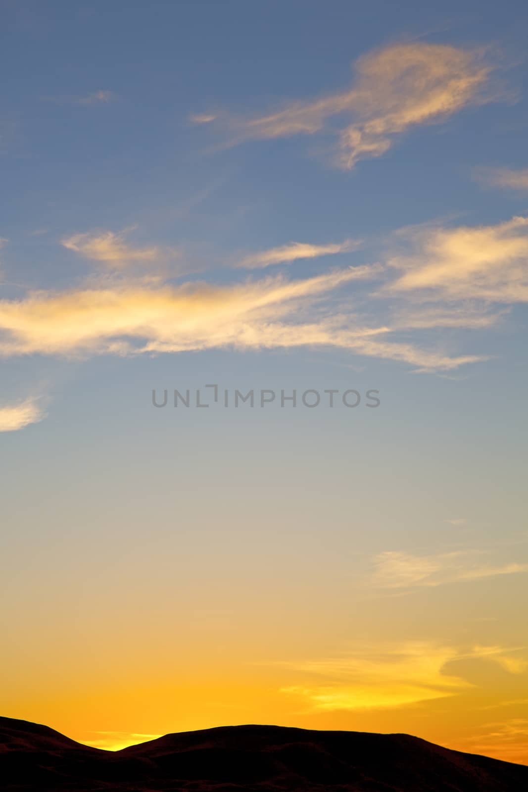 sunrise  in the colored sky white soft clouds and abstract background