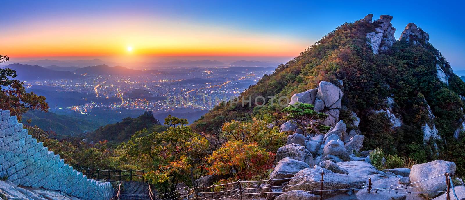 Sunrise at Baegundae peak and Bukhansan mountains in autumn,Seoul in South Korea.