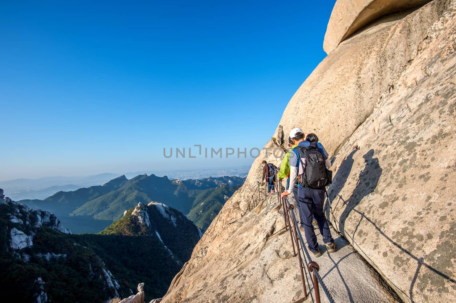 Climbers and Tourists on Bukhansan mountain. by gutarphotoghaphy