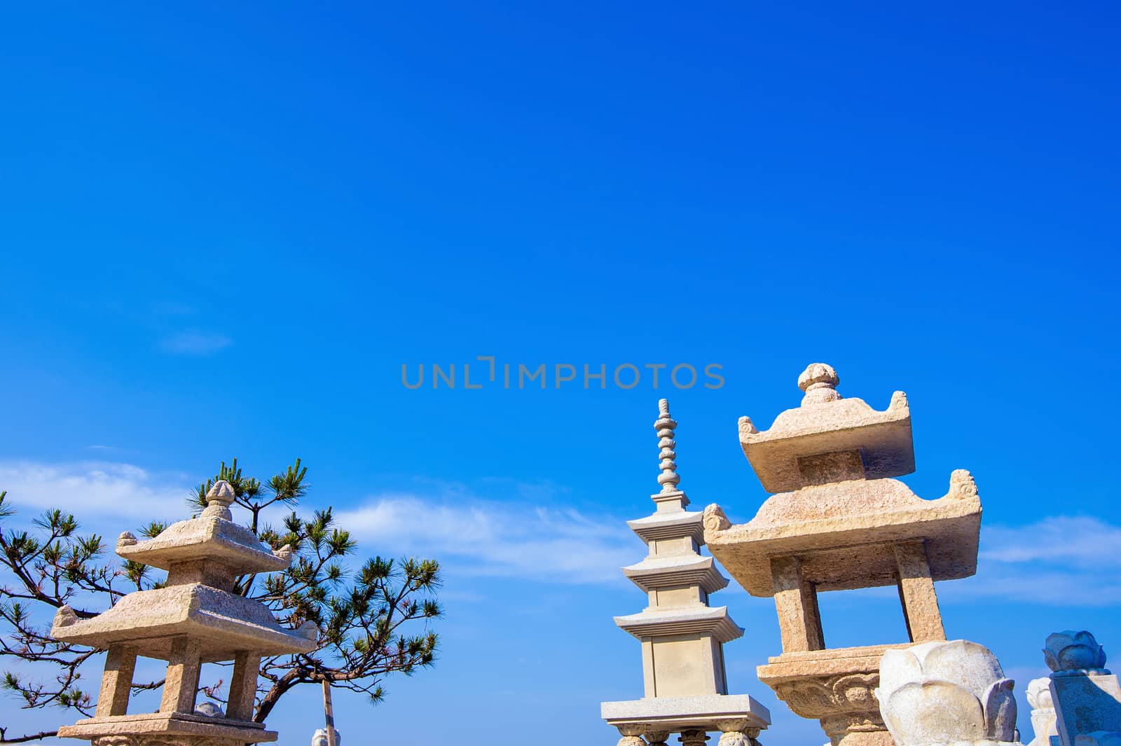 A stone pavilion and blue sky by gutarphotoghaphy