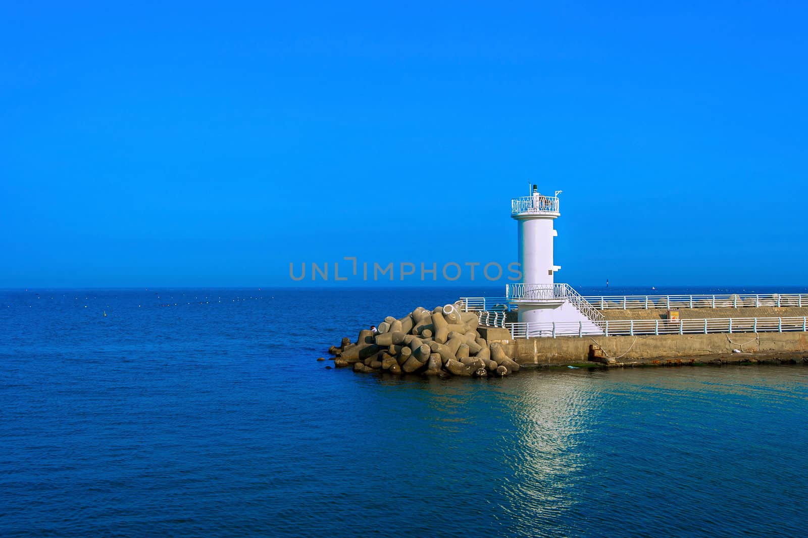 Lighthouse on sea by gutarphotoghaphy