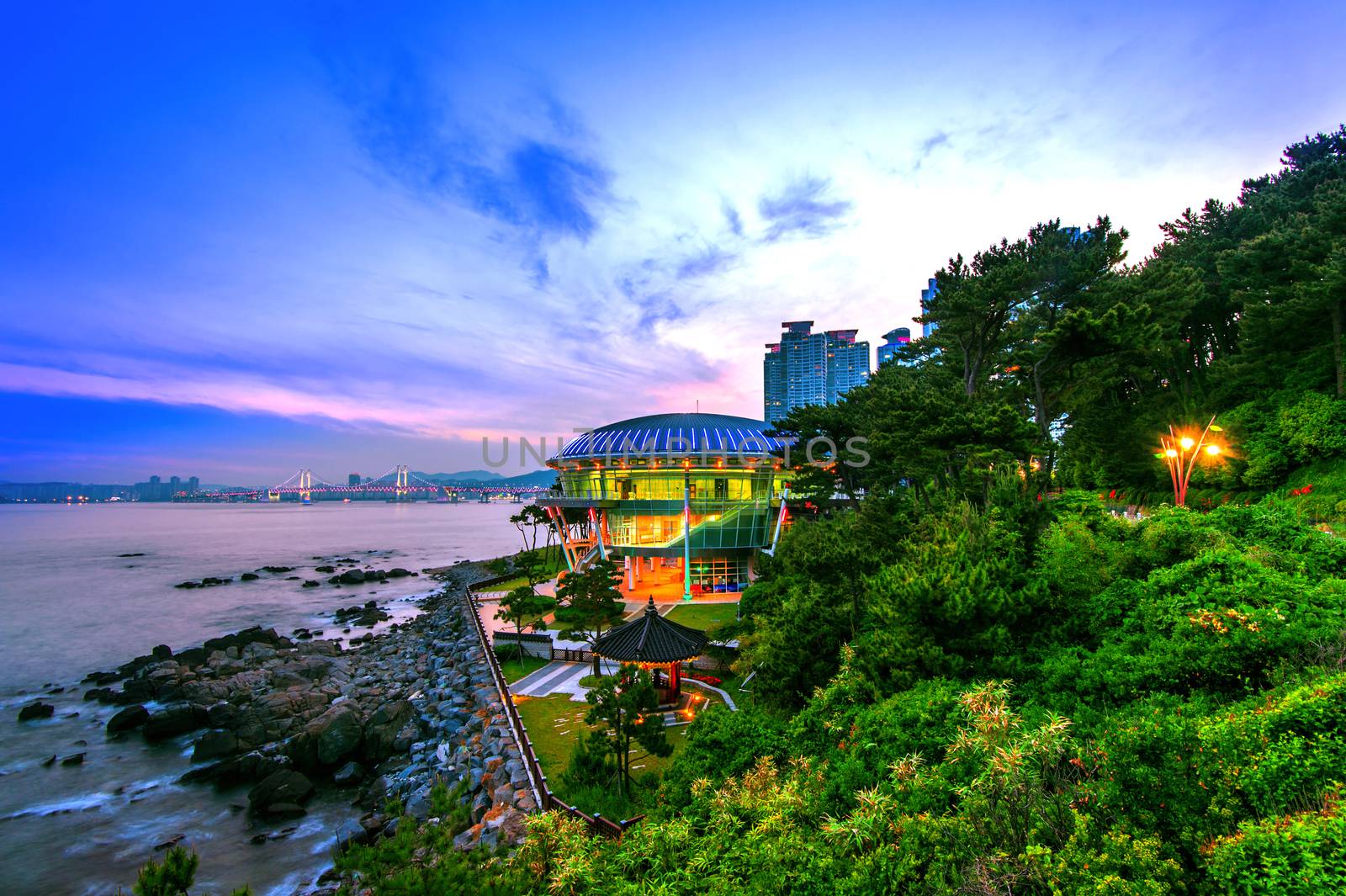 Dongbaek island with Nurimaru APEC House and Gwangan bridge at sunset in Busan,South Korea