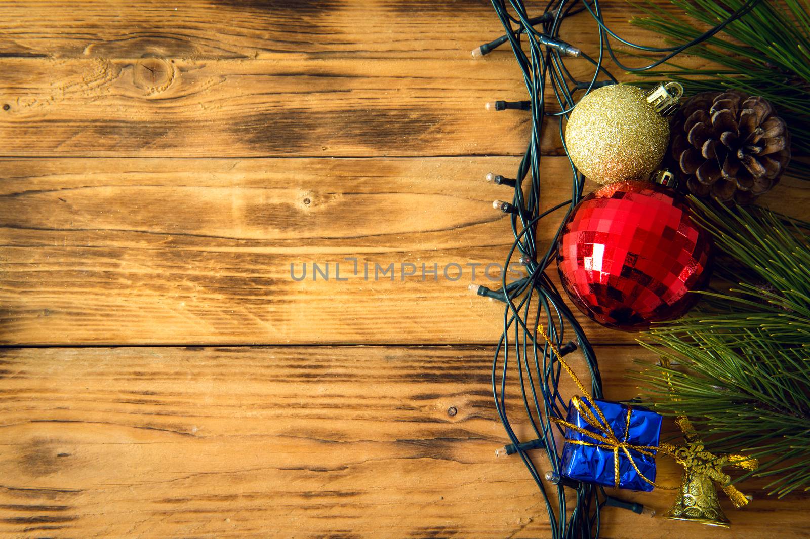 Christmas background with christmas gift,red balls, pine cones on Wooden Background. Christmas vintage style
