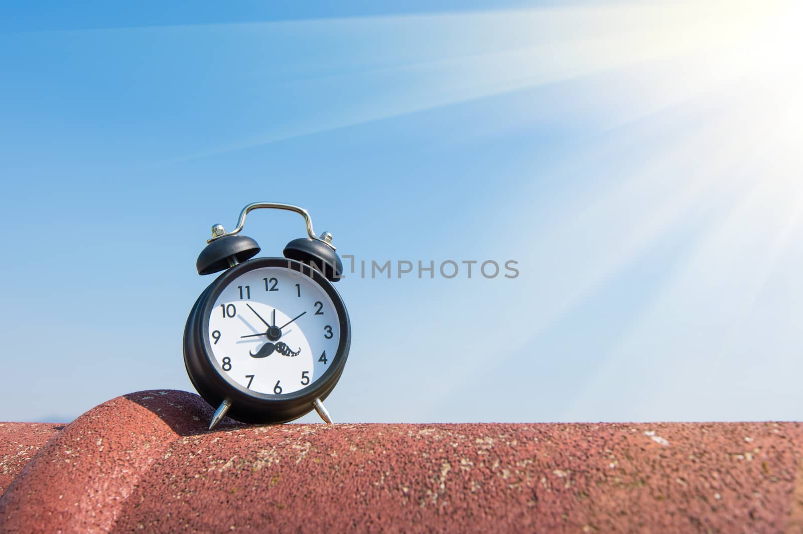 Alarm clock and sun light. by gutarphotoghaphy