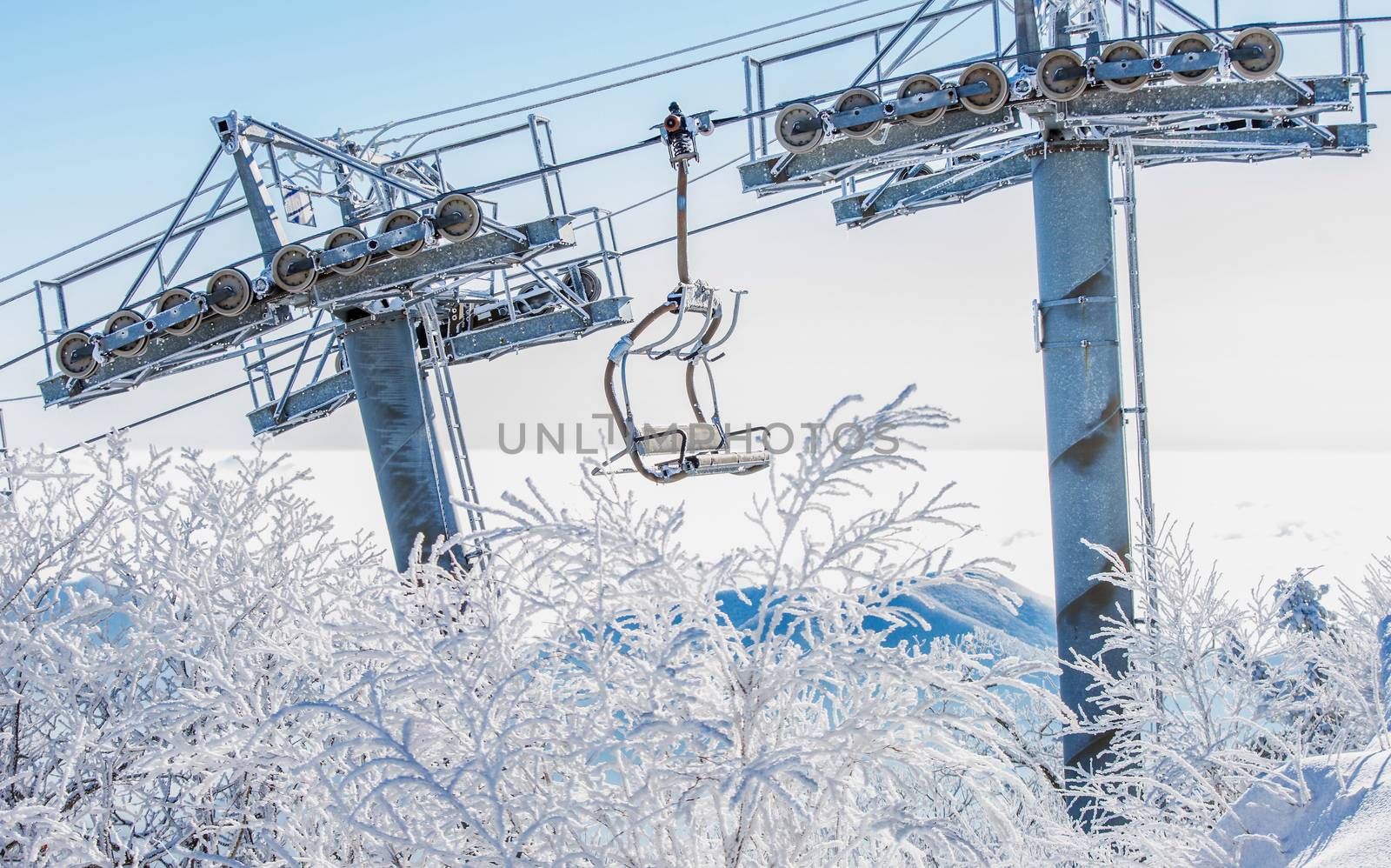 Ski chair lift is covered by snow in winter, Korea.