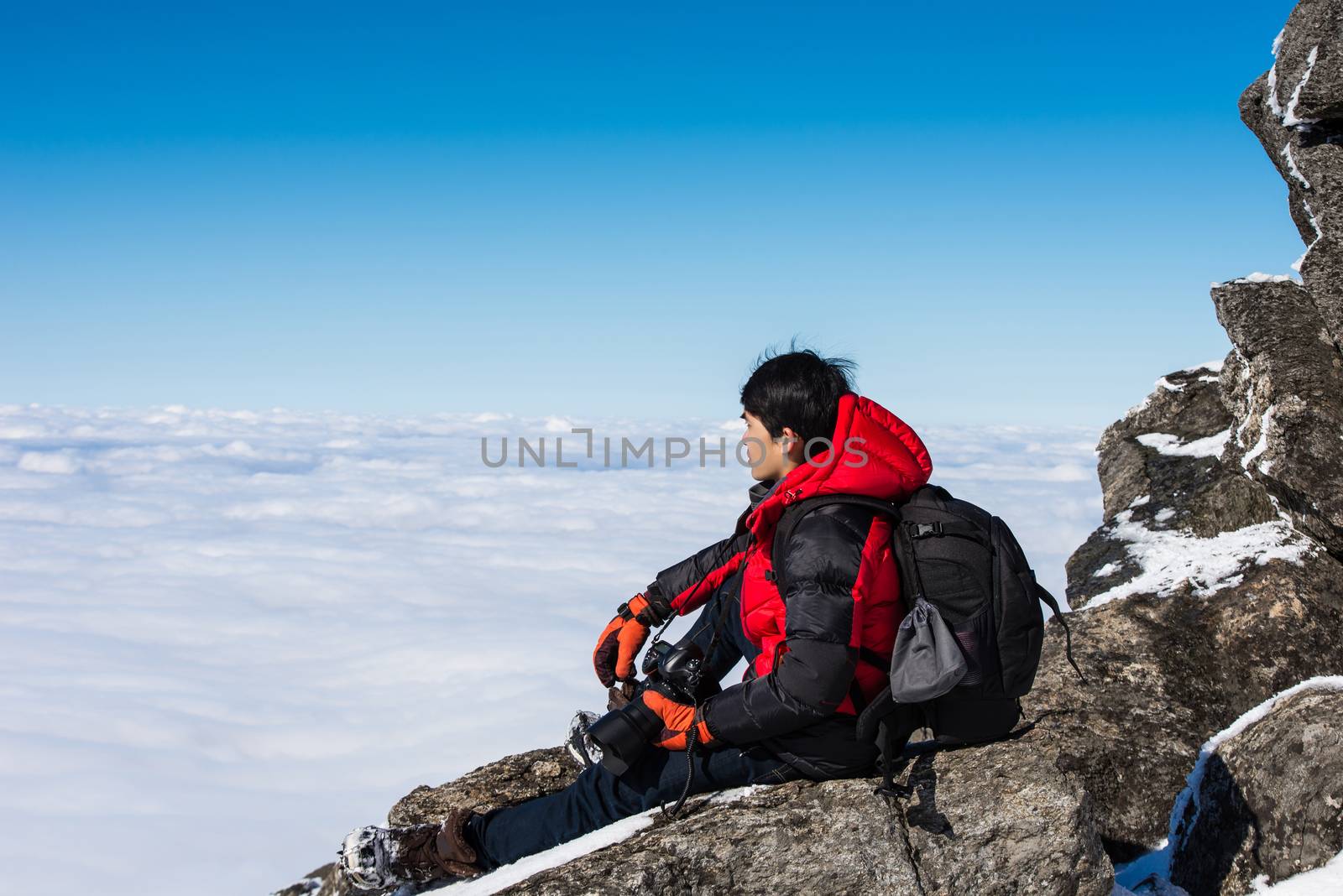 Man on top of mountain,Landscape in winter