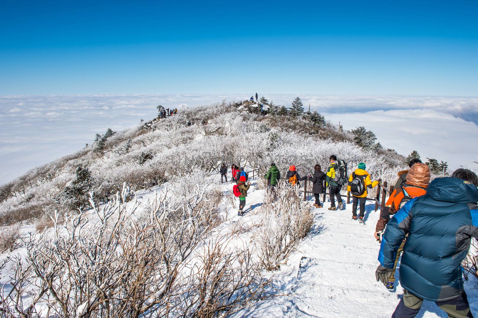 DEOGYUSAN,KOREA - JANUARY 23: Tourists taking photos of the beautiful scenery around Deogyusan,South Korea on January 23, 2015.