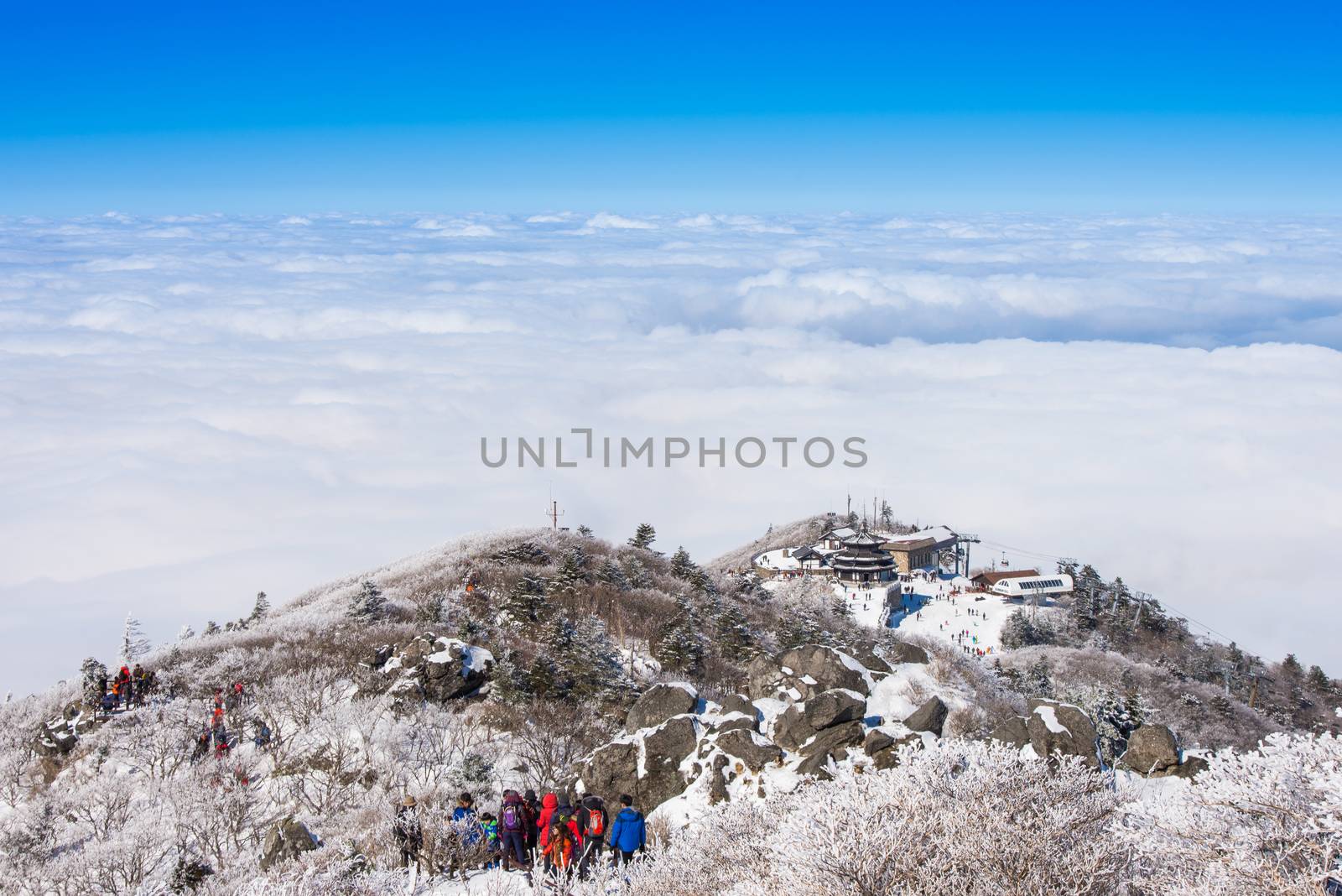 DEOGYUSAN,KOREA - JANUARY 23: Tourists taking photos of the beautiful scenery around Deogyusan,South Korea on January 23, 2015.