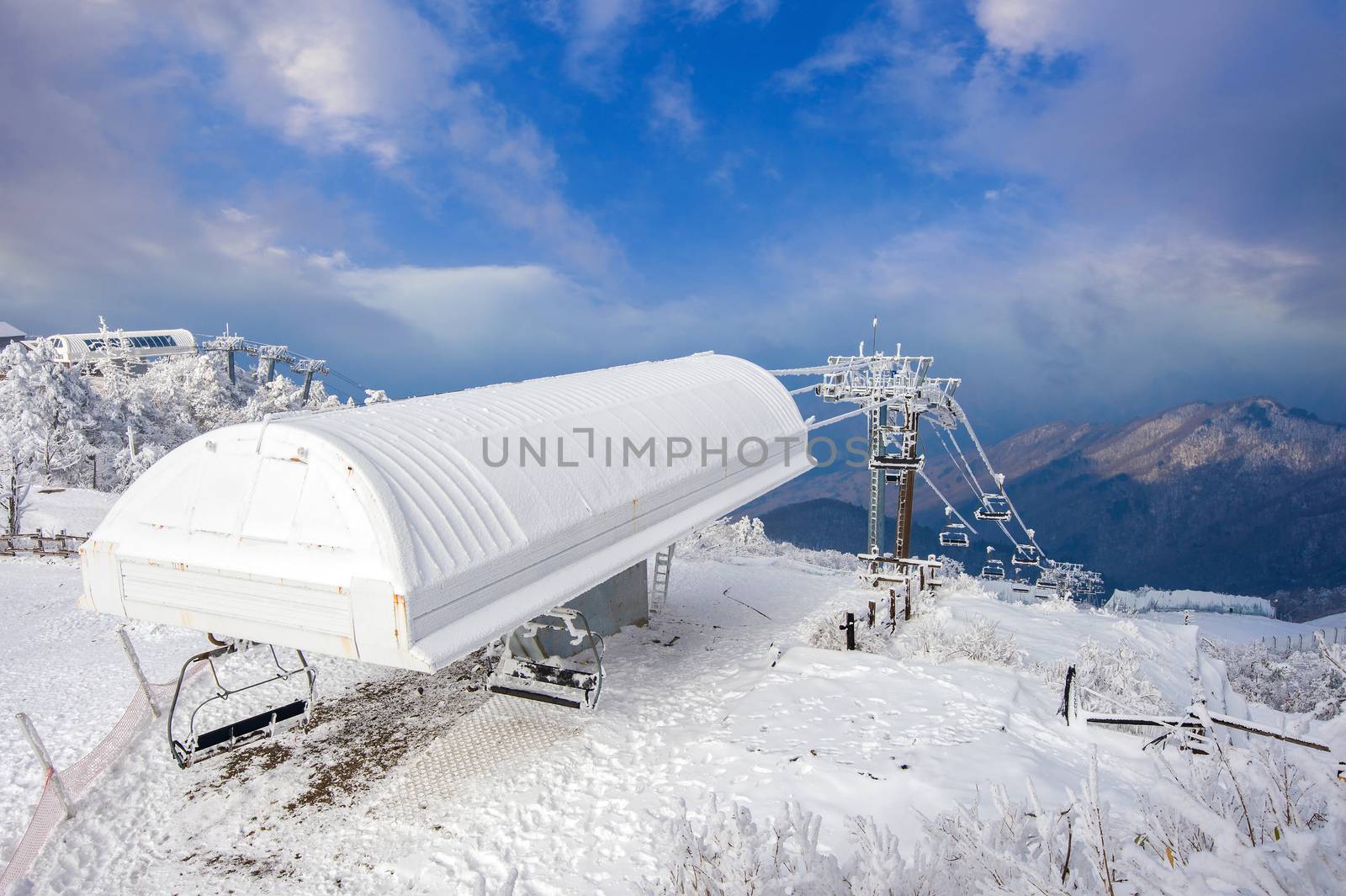 Ski chair lift is covered by snow in winter,Deogyusan mountains  by gutarphotoghaphy