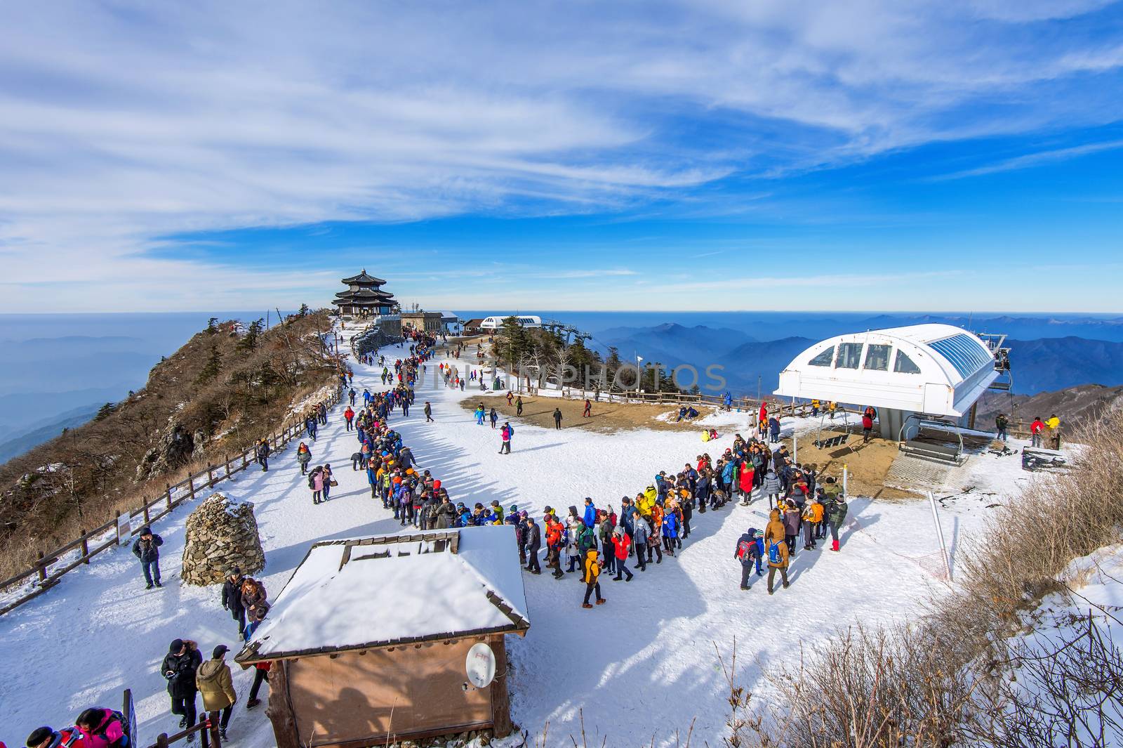 DEOGYUSAN,KOREA - JANUARY 1: Tourists taking photos of the beautiful scenery and skiing around Deogyusan,South Korea on January 1, 2016.