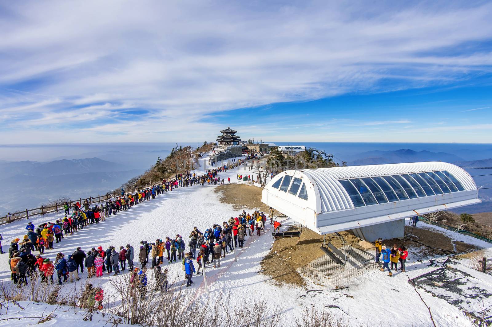 DEOGYUSAN,KOREA - JANUARY 1: Tourists taking photos of the beautiful scenery and skiing around Deogyusan,South Korea on January 1, 2016.