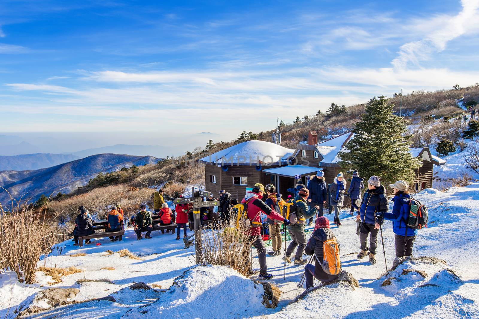 DEOGYUSAN,KOREA - JANUARY 1: Tourists taking photos of the beautiful scenery and skiing around Deogyusan,South Korea on January 1, 2016.