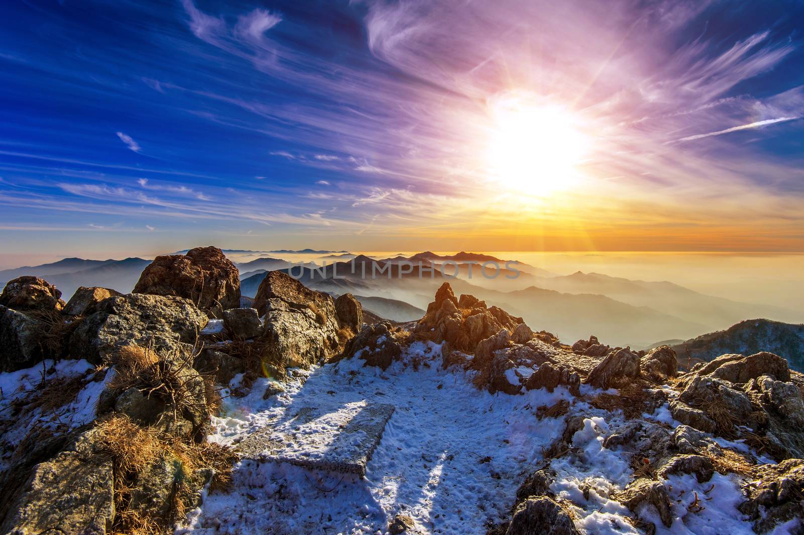 Winter landscape with sunset and foggy in Deogyusan mountains, South Korea.