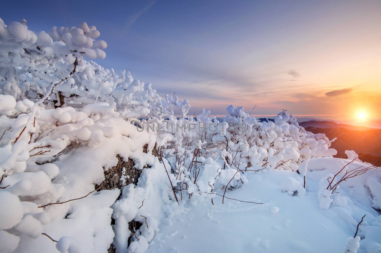 Sunrise on Deogyusan mountains covered with snow in winter,South Korea.