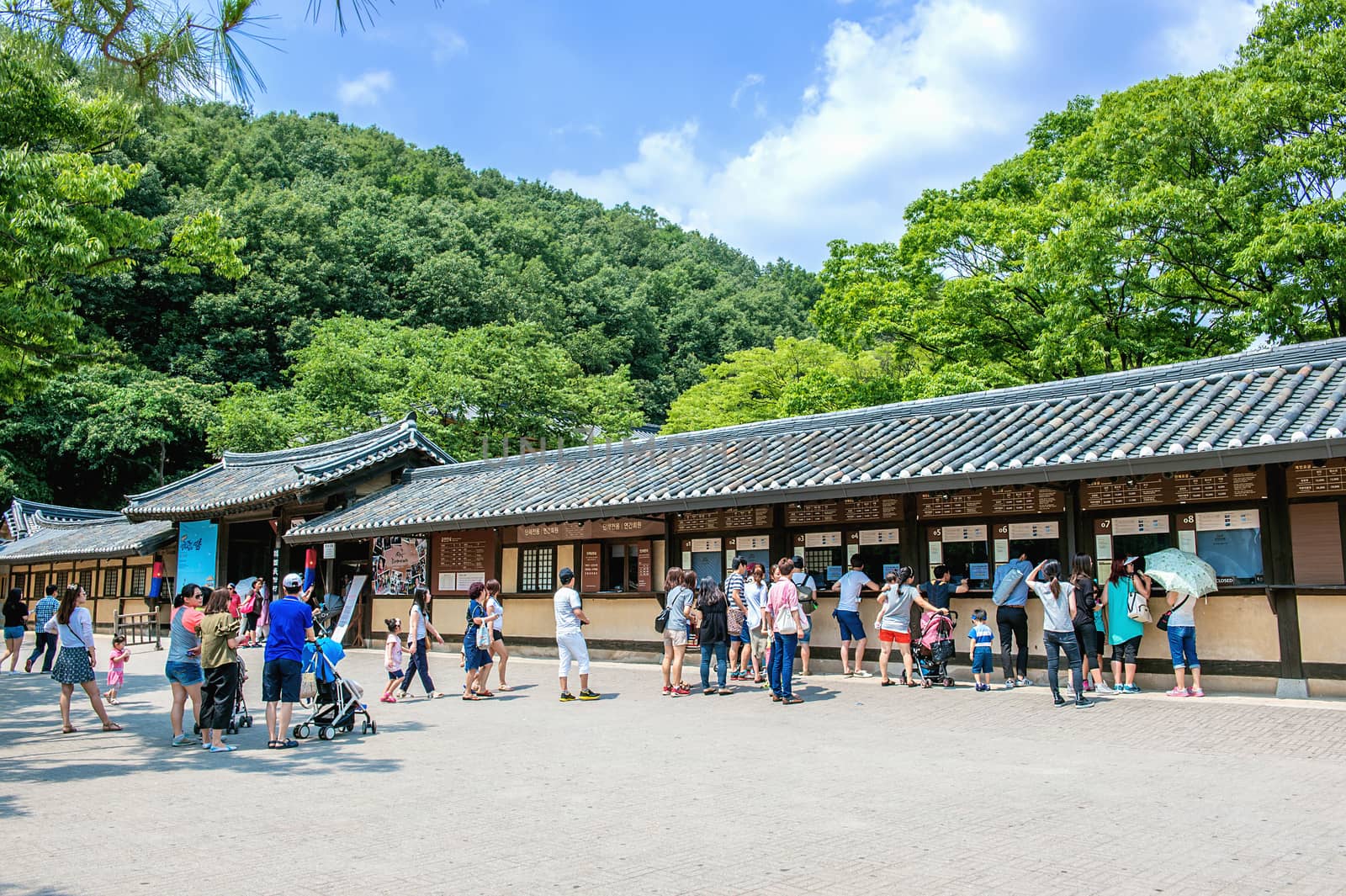 SUWON, SOUTH KOREA - JULY 5: Korean Folk Village,Traditional Korean style architecture and Tourists in Korean Folk Village on July 5, 2015 in Suwon, South Korea.