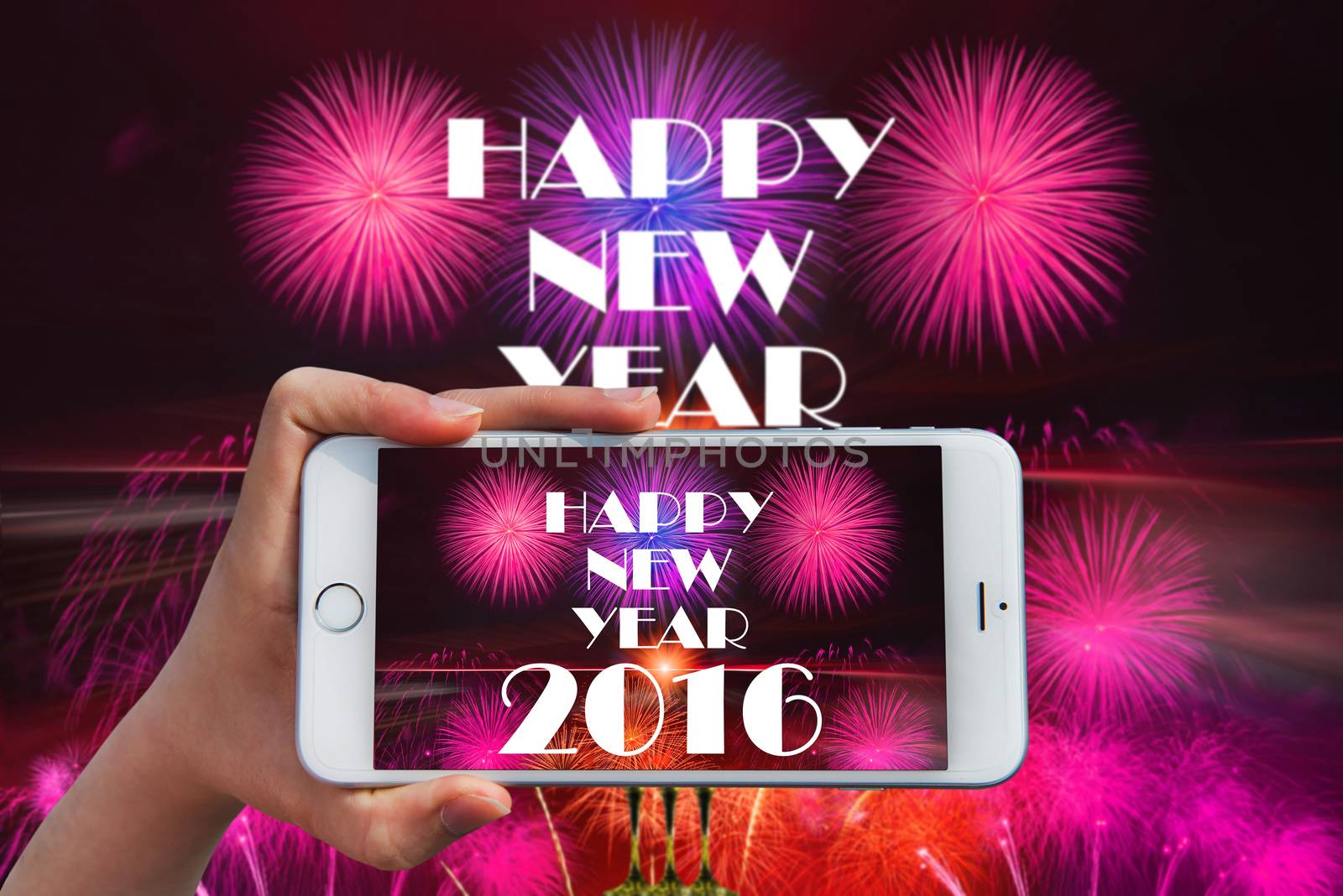 Hand holding smart phone take a photo at happy new year 2016 and by gutarphotoghaphy