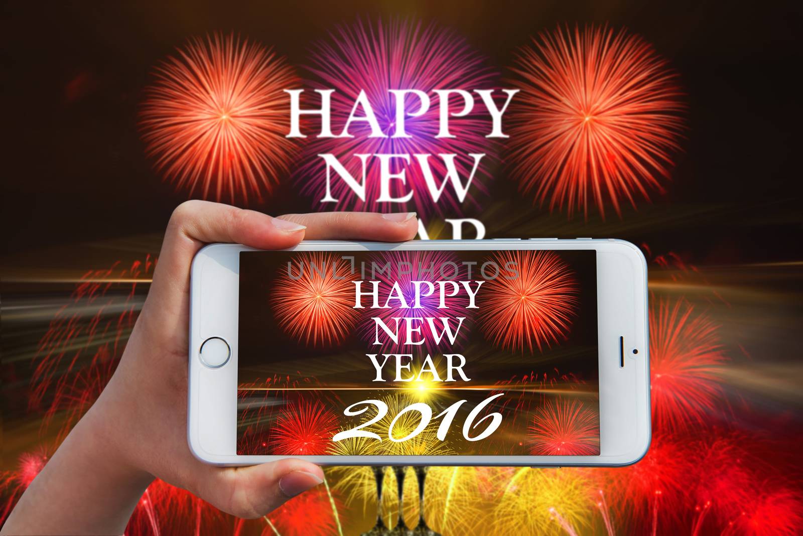 Hand holding smart phone take a photo at happy new year 2016 and by gutarphotoghaphy