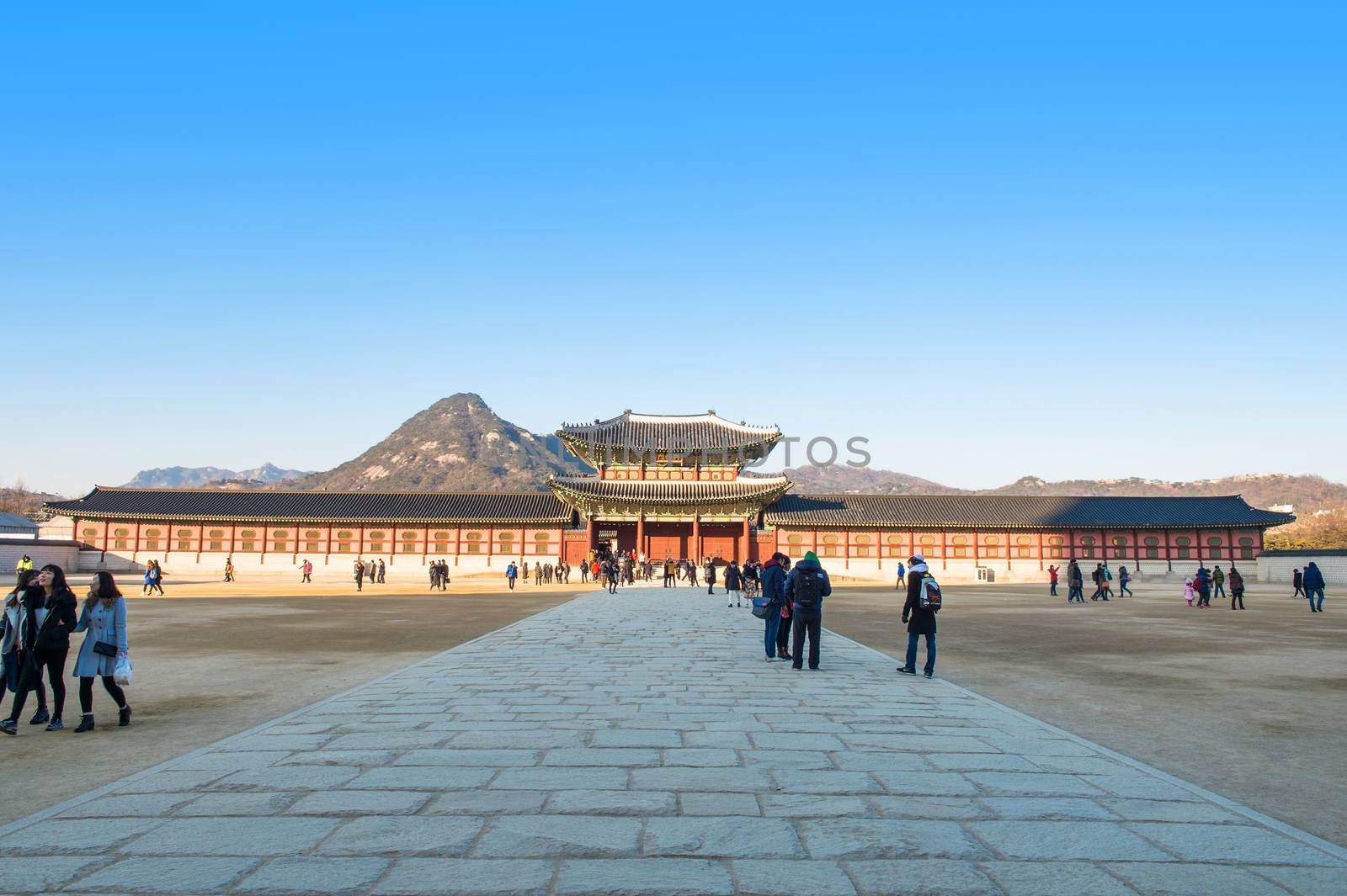 SEOUL, SOUTH KOREA - JANUARY 17: Tourists taking photos of the beautiful scenery around Gyeongbokgung Palace on January 17, 2015 in Seoul, South Korea.