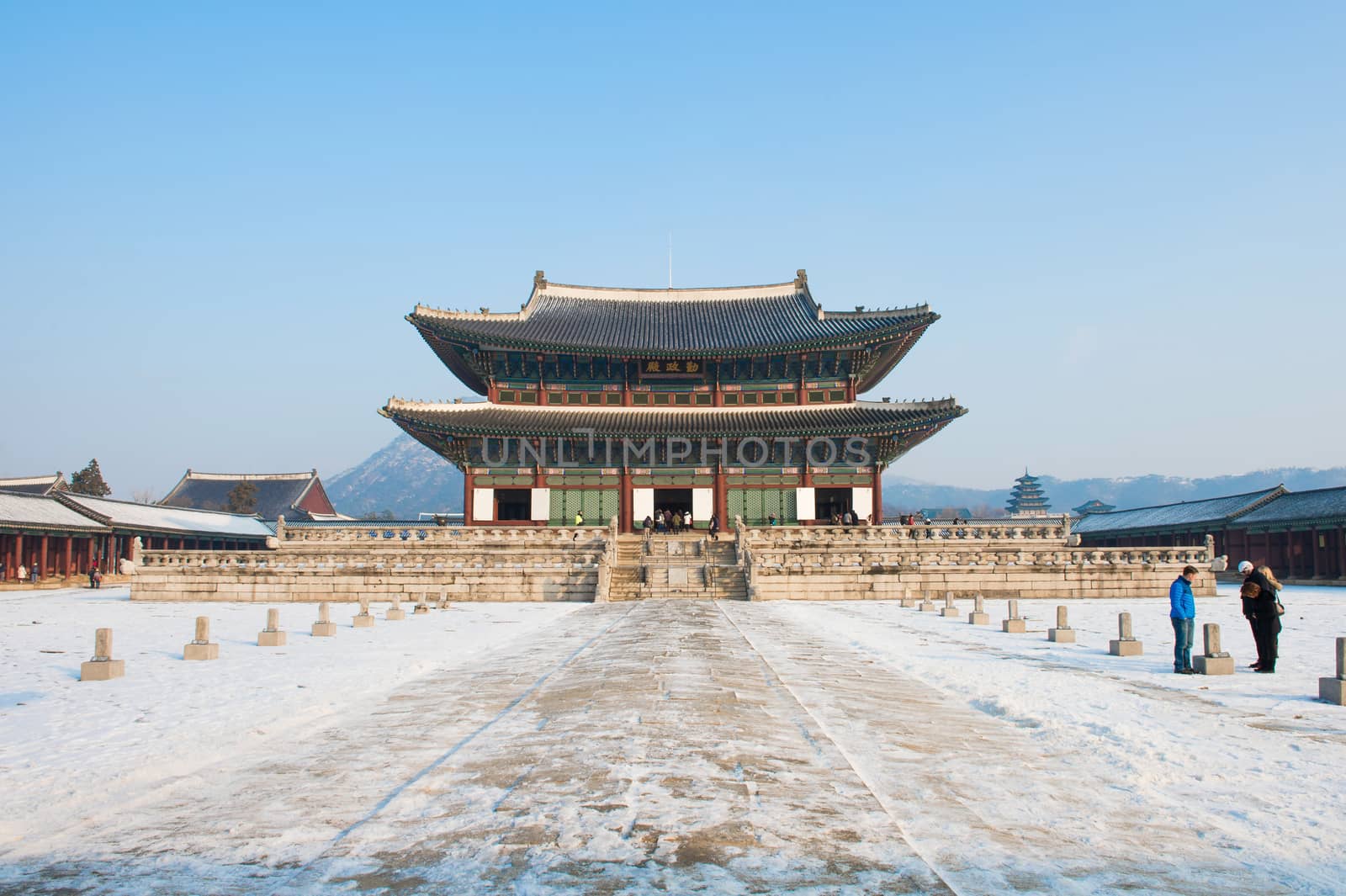 SEOUL, SOUTH KOREA - JANUARY 19: Tourists taking photos of the beautiful scenery around Gyeongbokgung Palace on January 19, 2015 in Seoul, South Korea.