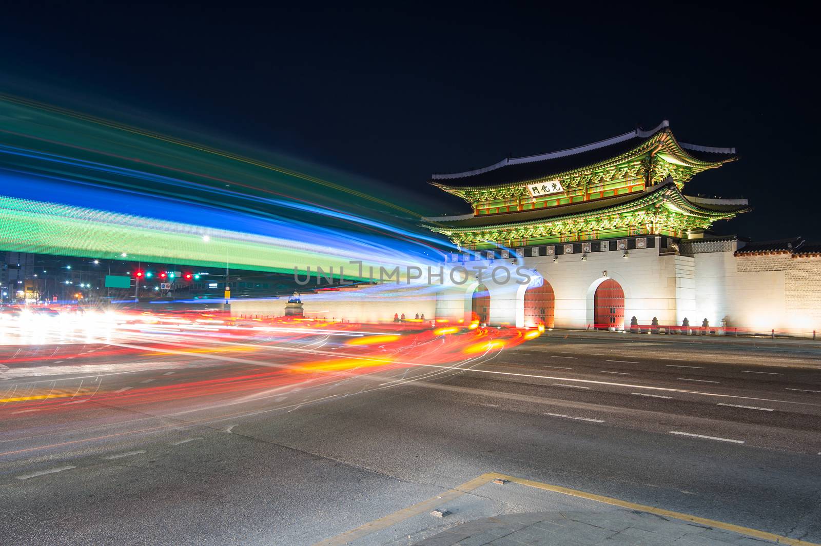 Geyongbokgung Palace and car light at night in Seoul, South Korea.