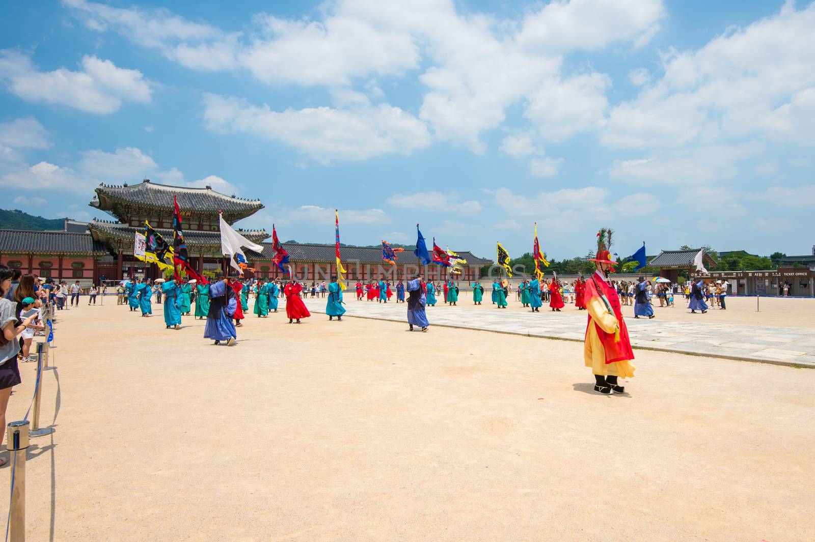 Soldier with traditional Joseon dynasty uniform guards the Gyeongbokgung Palace. by gutarphotoghaphy