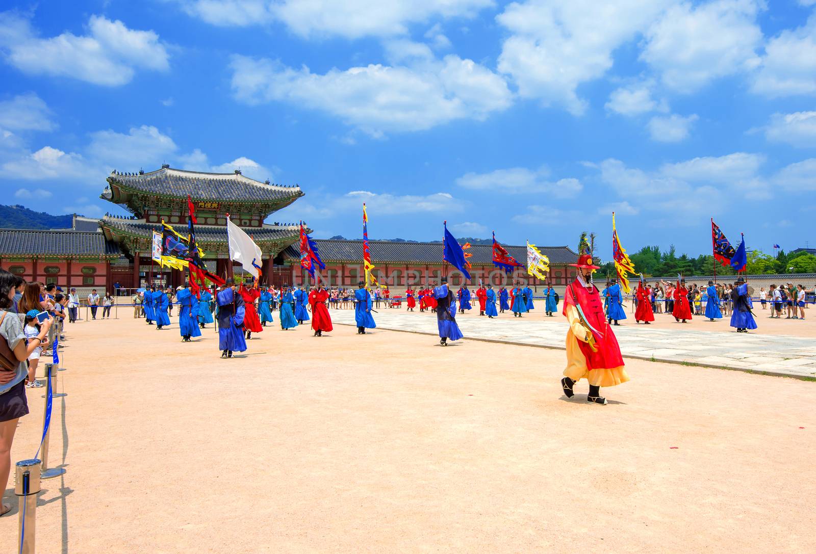 Soldier with traditional Joseon dynasty uniform guards the Gyeongbokgung Palace. by gutarphotoghaphy