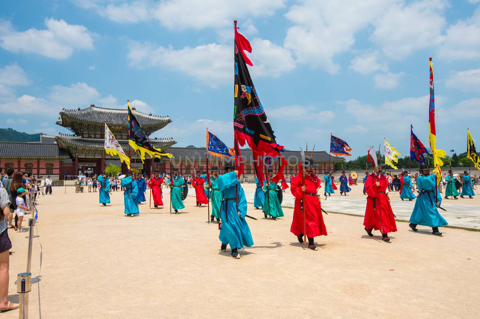 Soldier with traditional Joseon dynasty uniform guards the Gyeongbokgung Palace. by gutarphotoghaphy