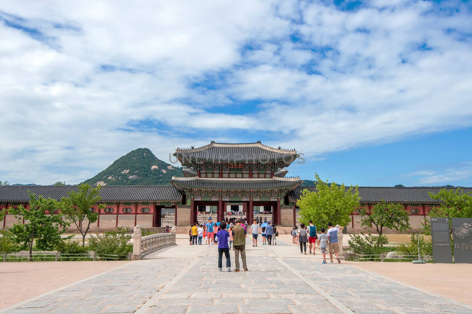 SEOUL, SOUTH KOREA - JULY 17: Tourists taking photos of the beautiful scenery around Gyeongbokgung Palace on July 17, 2015 in Seoul, South Korea.